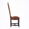 Four Louis XIII Style Leather Dining Chairs