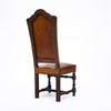 Four Louis XIII Style Leather Dining Chairs