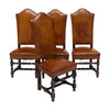 Four Louis XIII Style Leather Dining Chairs